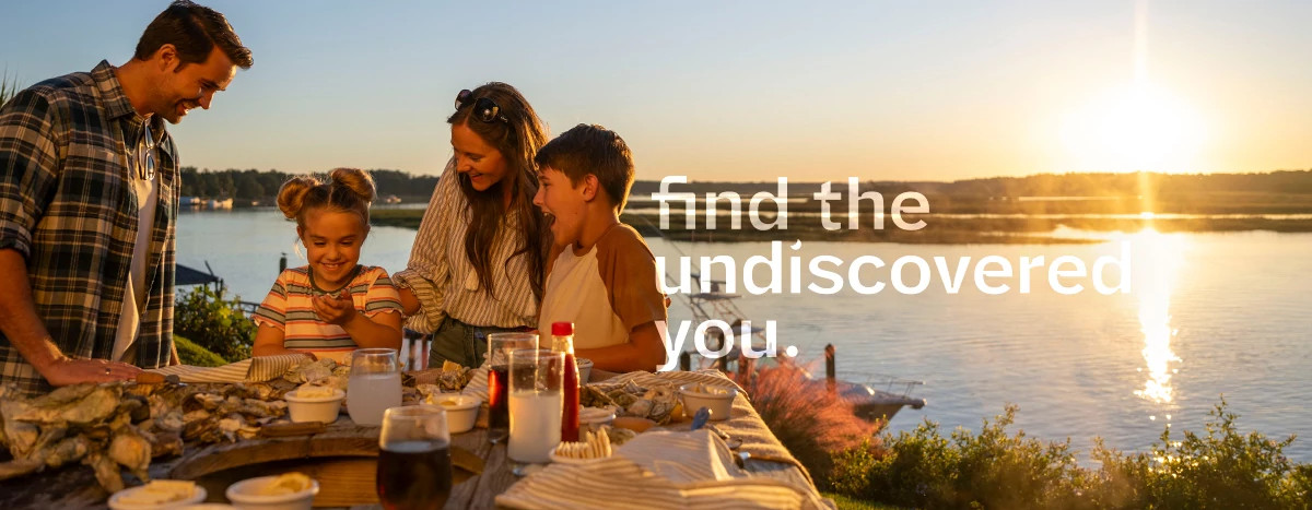 family enjoying an oyster roast