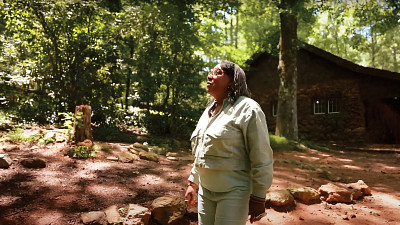 local historian, outdoors, cabin